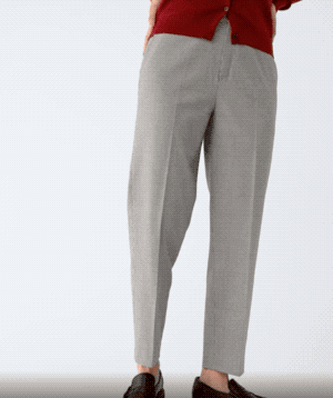gif of a model in the grey checkered pants with pleated detailing