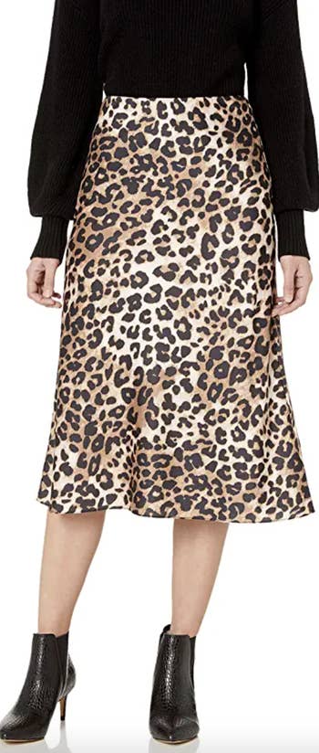 model wearing the skirt in leopard print