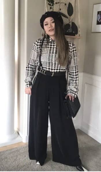 reviewer wearing the pants in black