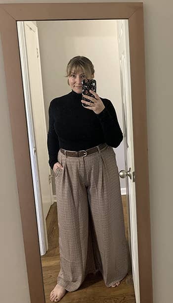different reviewer wearing the pants in brown plaid