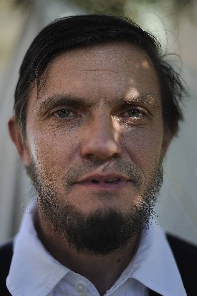 Close-up of Ralph Lincoln, with a beard and light mustache and thick eyebrows