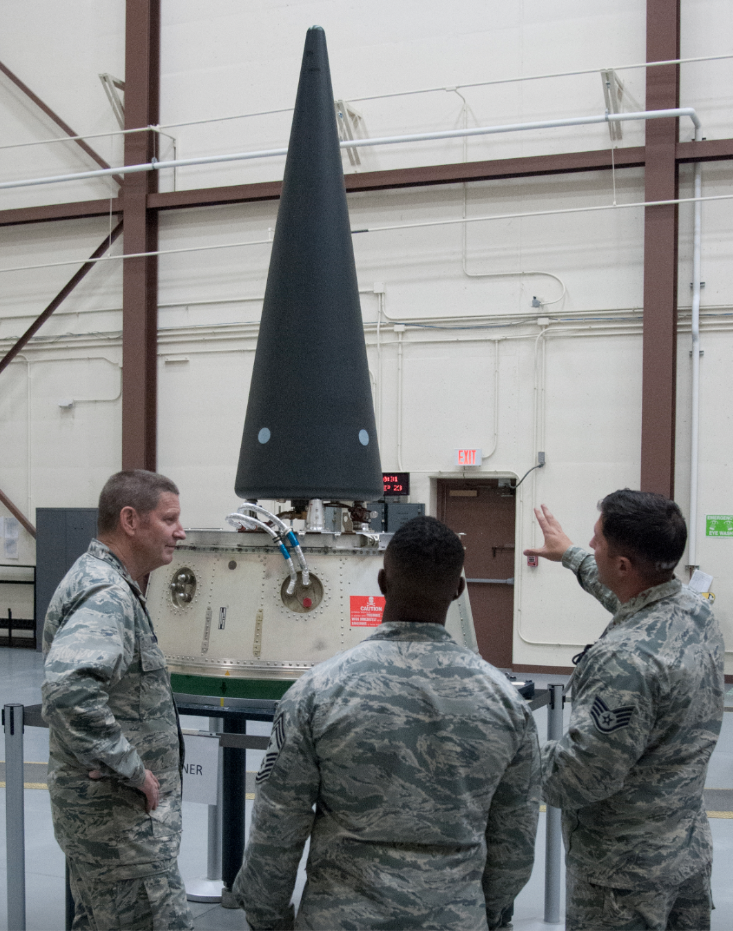 Soldiers around a nuclear bomb