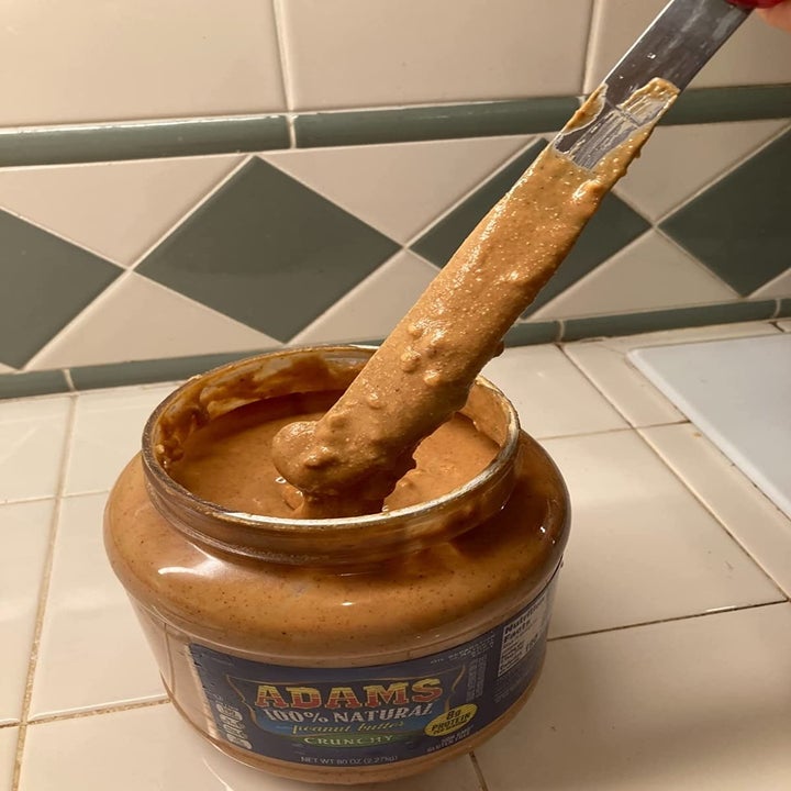 reviewer image of the knife out of the peanut butter jar
