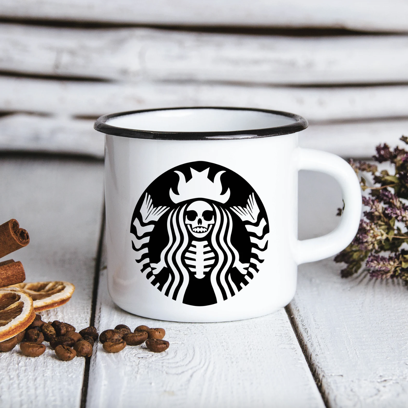 a stylized starbucks-inspired dead mermaid sticker on the front of a mug