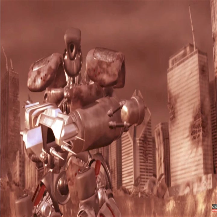 A transmorpher holds a gun and stands in a ruined city