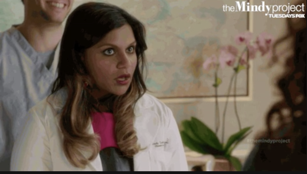 a female doctor looking shocked