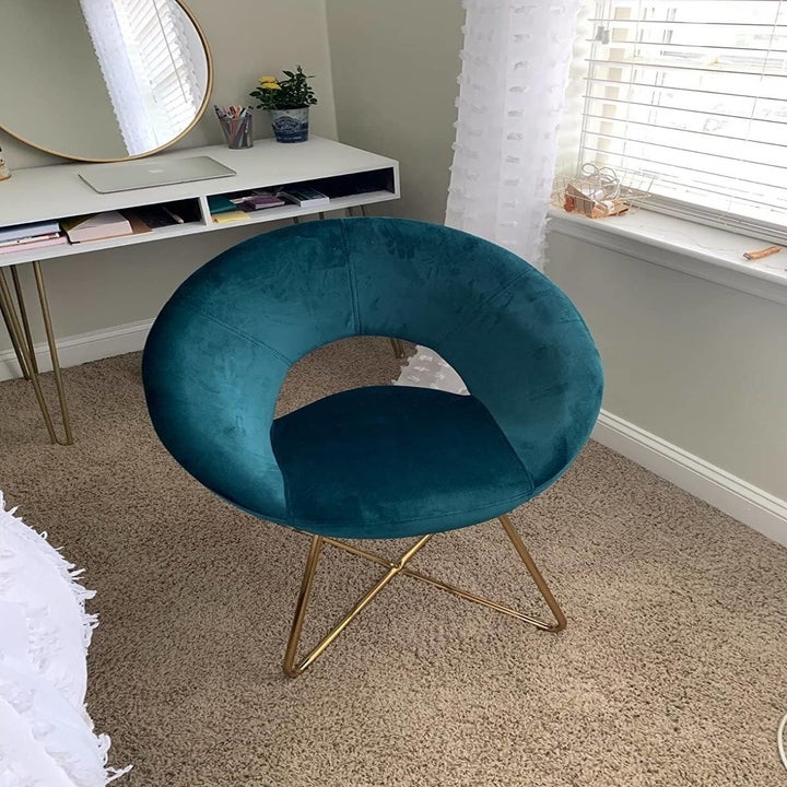 teal chair in reviewer's workspace