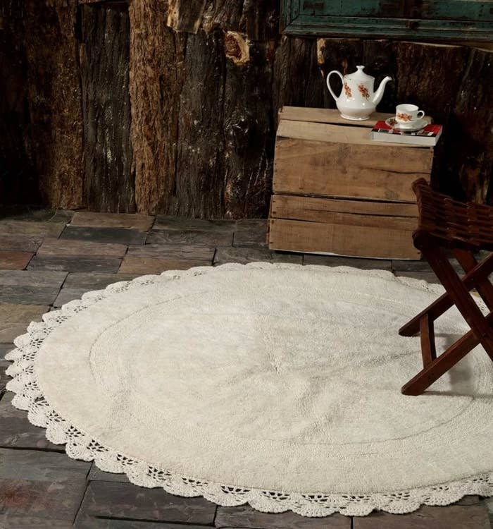 the one-of-a-kind hand-knotted 5&#x27; foot round lace scalloped cotton area rug in off white