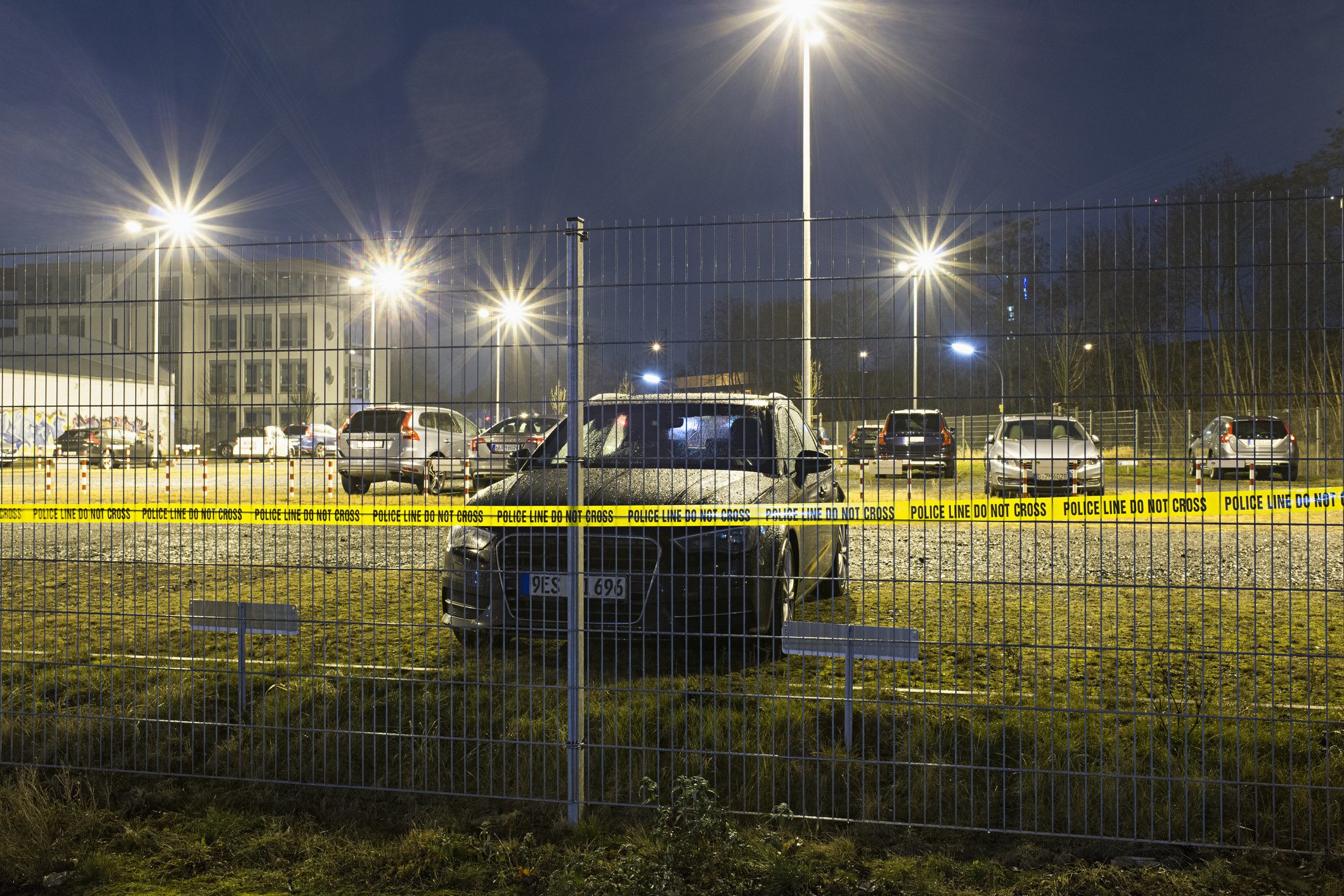 parking lot with police caution tape