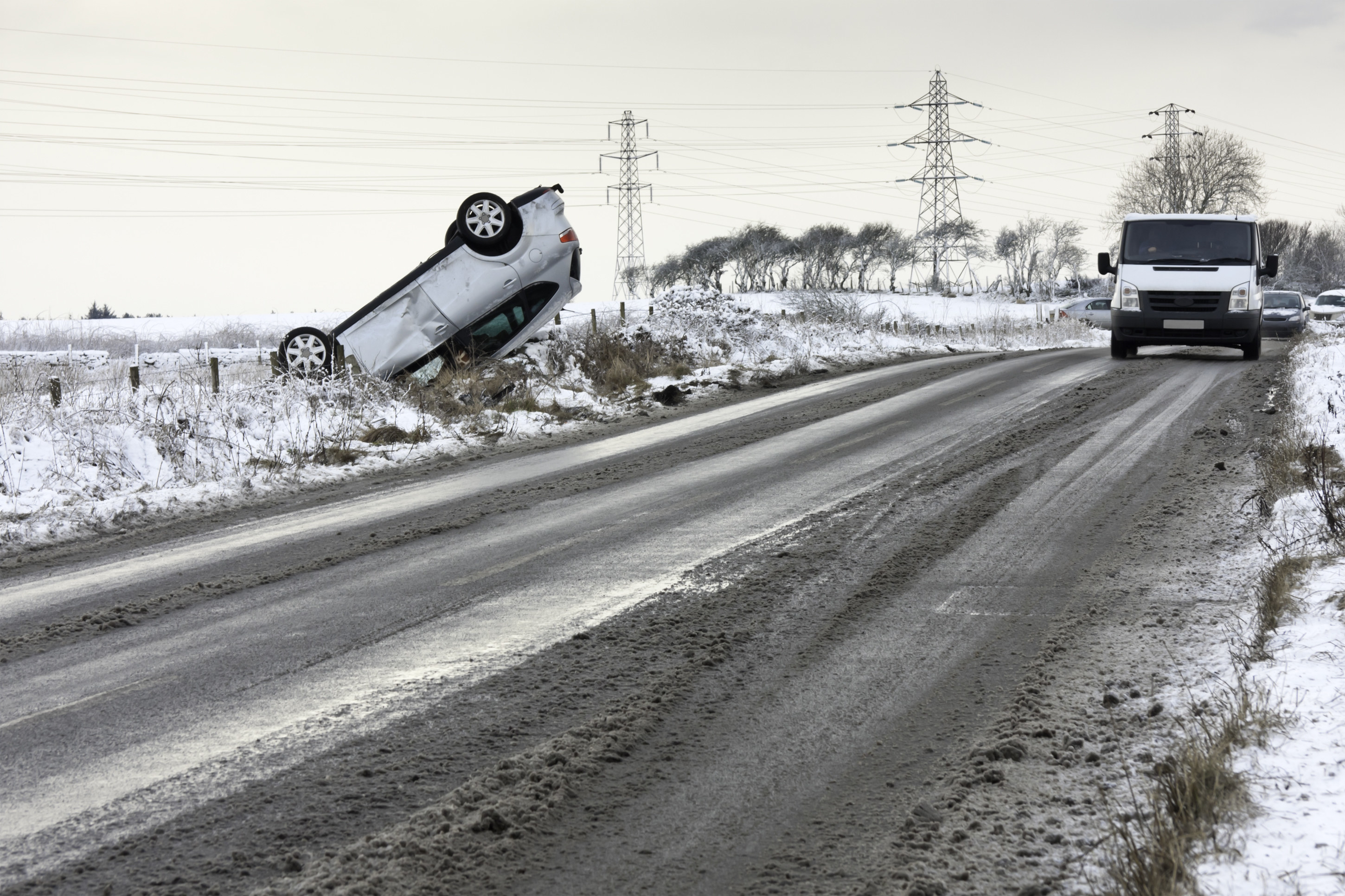 car flipped over in snow weather