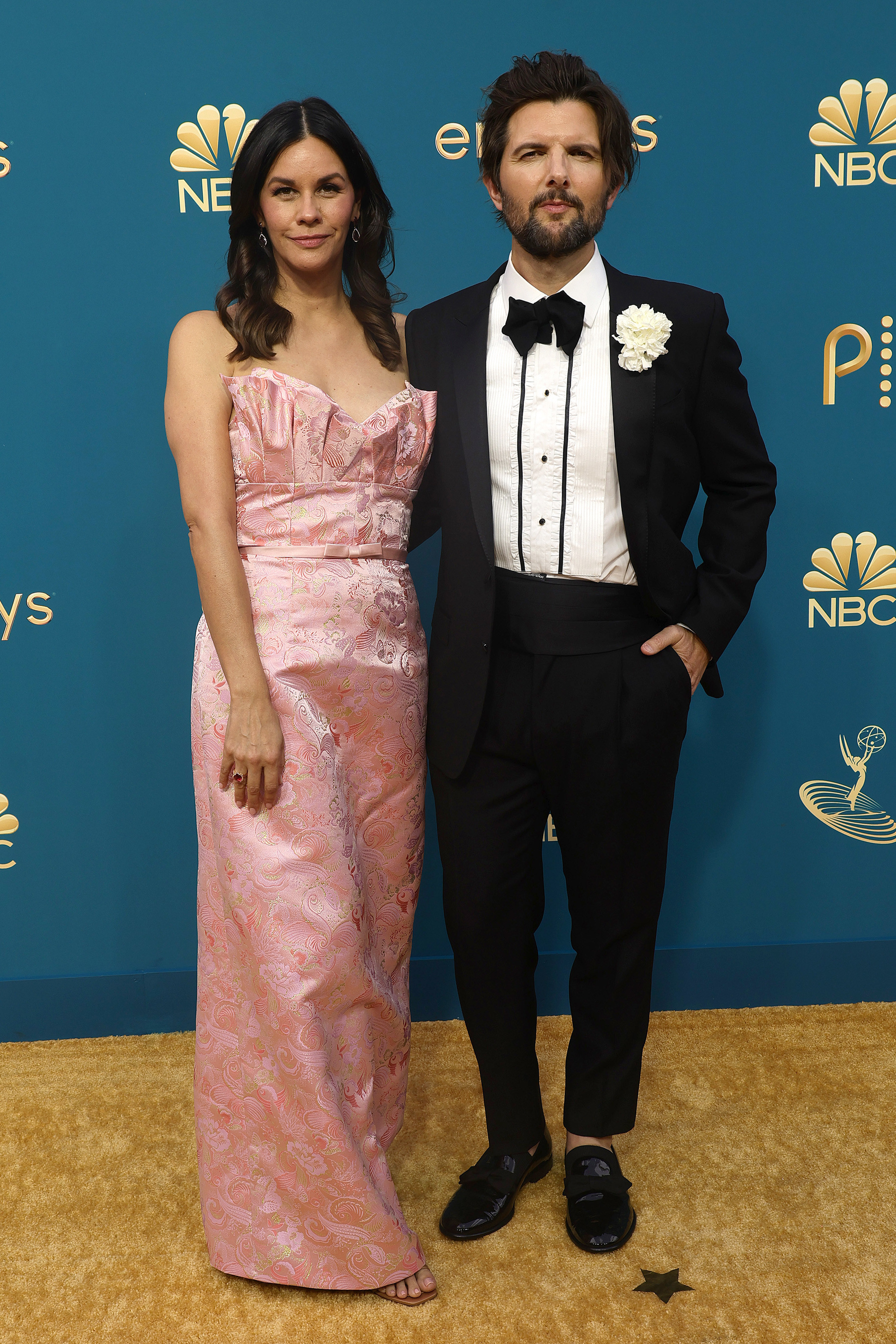 Naomi Scott in a pink dress and Adam Scott in a tux