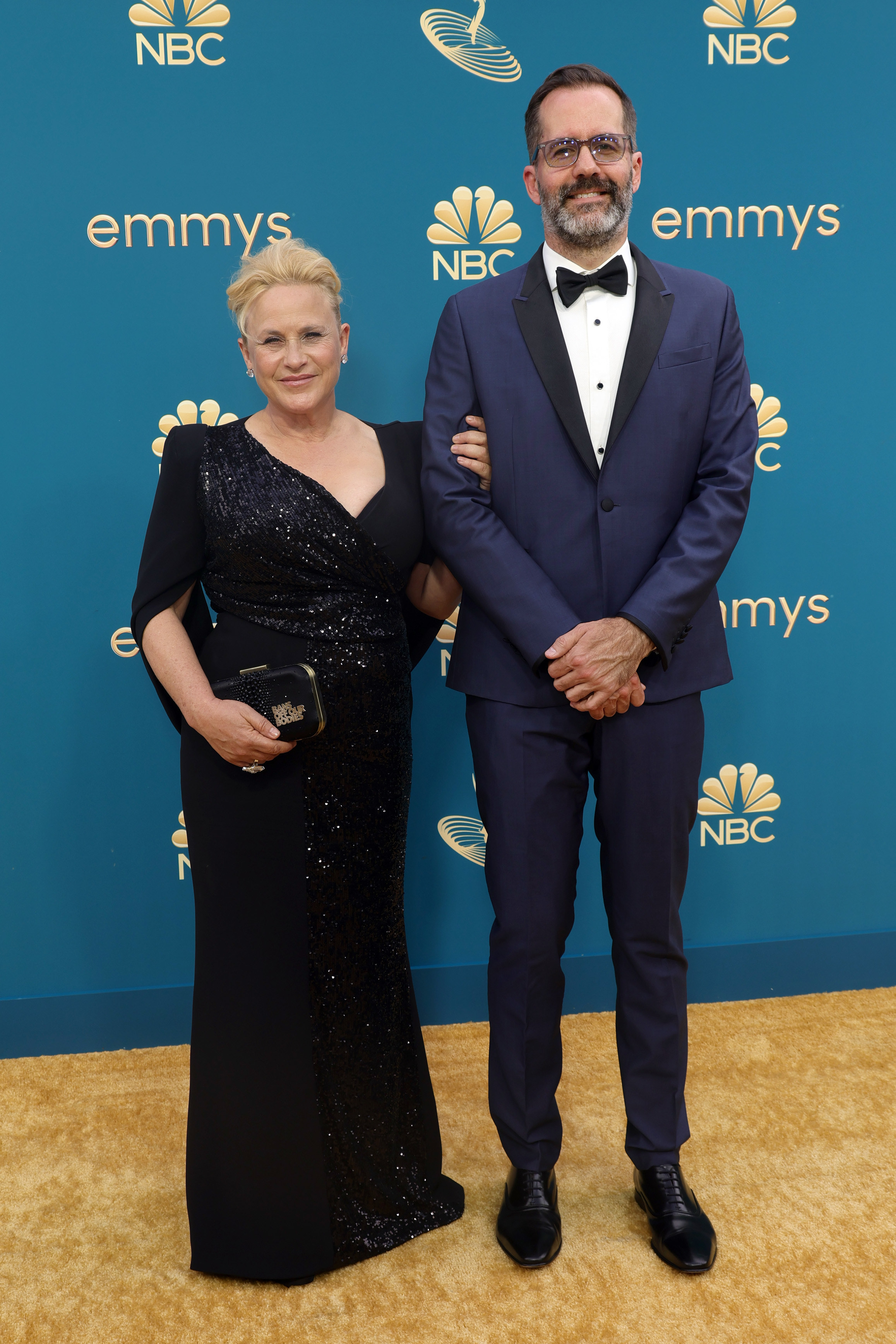Patricia Arquette and Eric White standing together