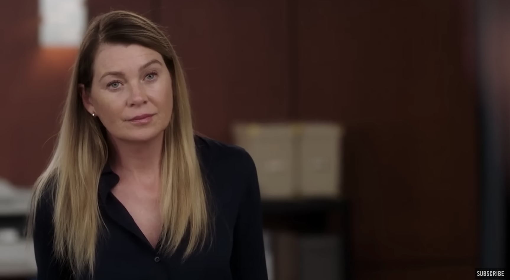 Meredith Grey wearing a black business shirt from a scene in Grey&#x27;s Anatomy