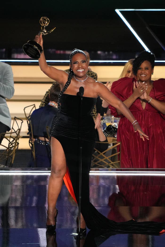 Sheryl Lee Ralph smiling and holding her award up