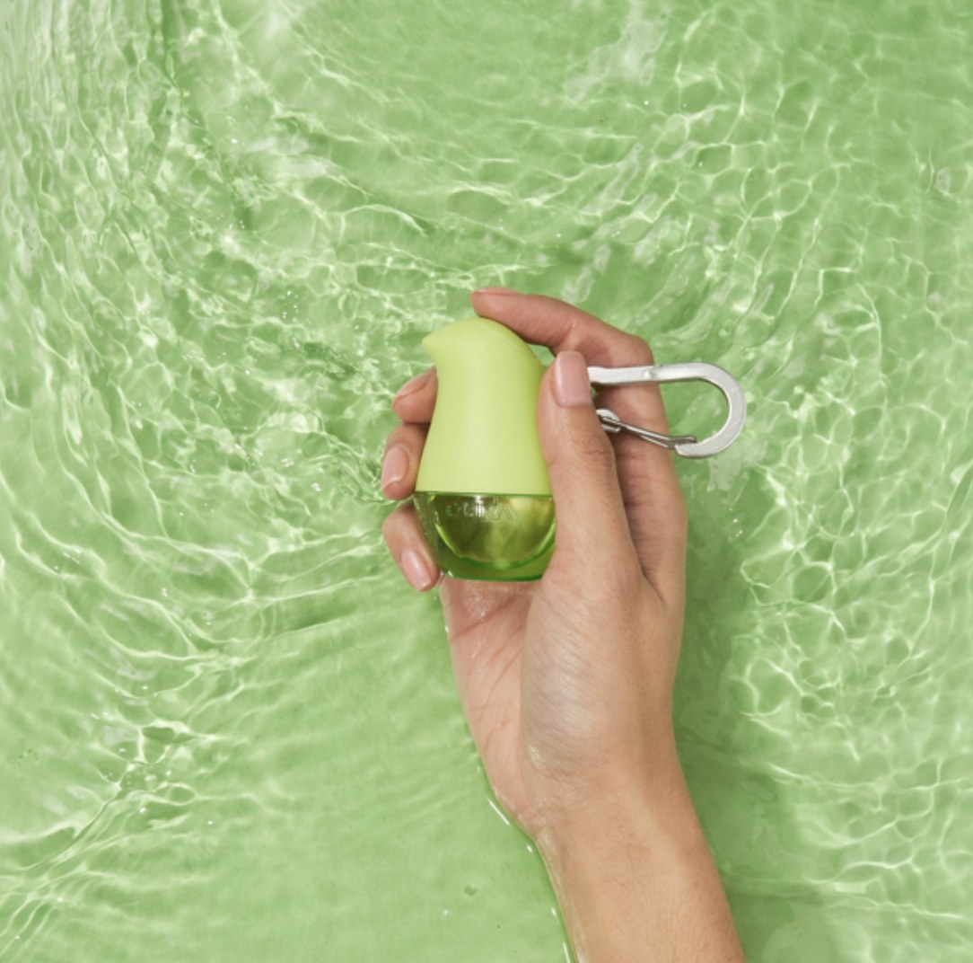 A green hand sanitizer