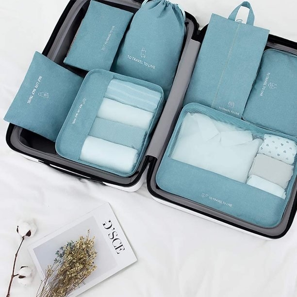 The packing cubes in the color Light Blue