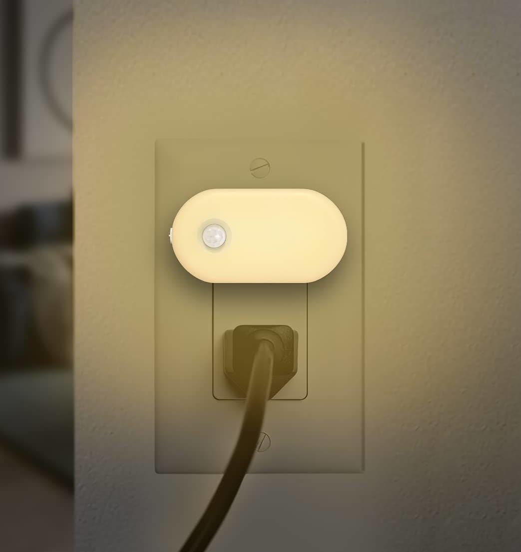 a night light plugged into a wall outlet