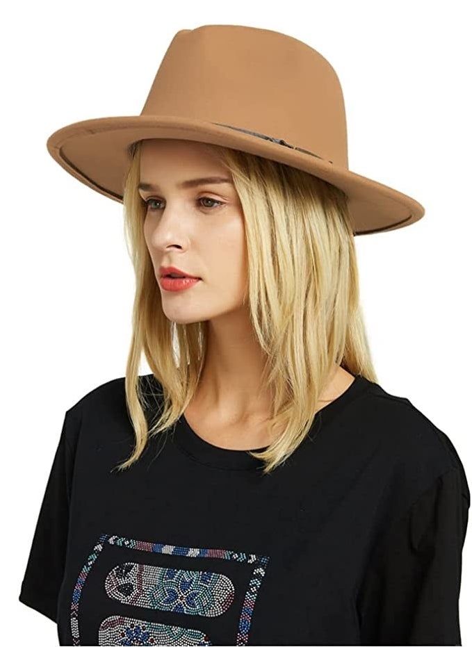a person wearing the hat in front of a plain background