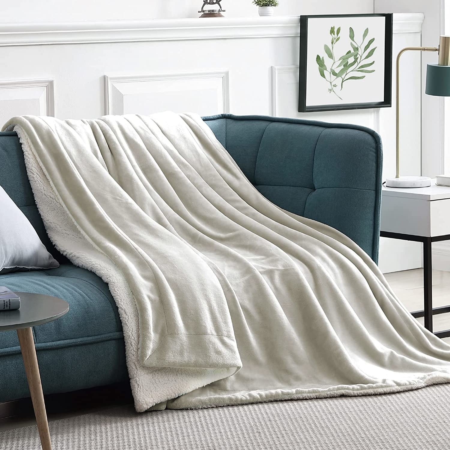 a double-sided blanket draped over a couch