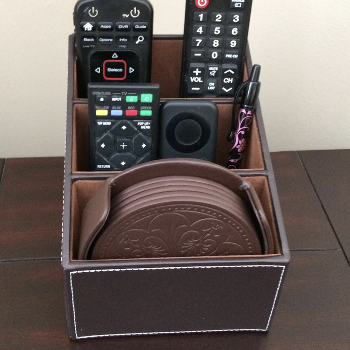 a reviewer with a filled remote control organizer