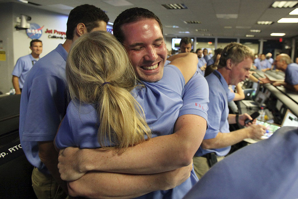 People at NASA hugging