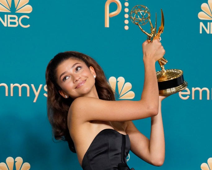 Zendaya holding her Emmy