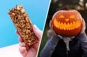 A hand holds a granola bar and a woman holds a pumpkin over her face