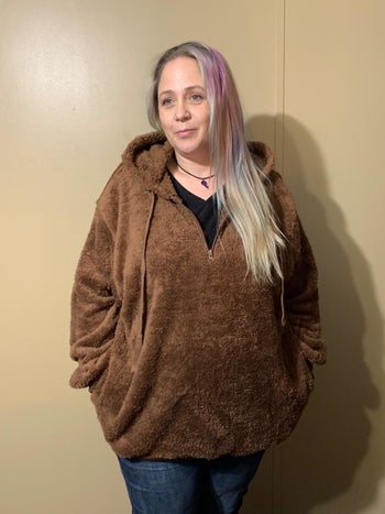 image of reviewer wearing the brown sweatshirt