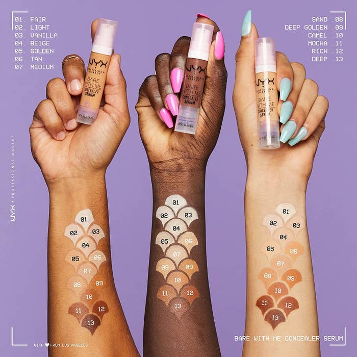 three arms of different skin tone holding the concealer up