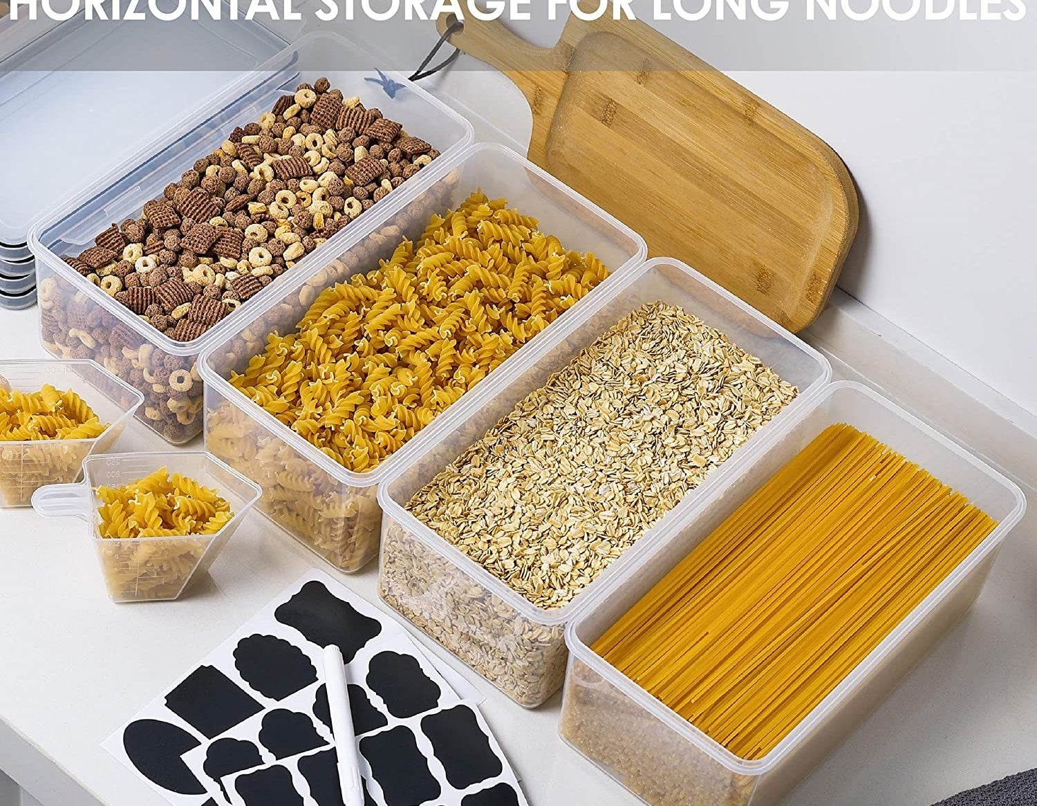 a set of long storage containers filled with pasta noodles, snacks, and oatmeal