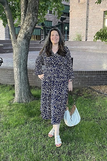 A customer review photo of them wearing the dress outside