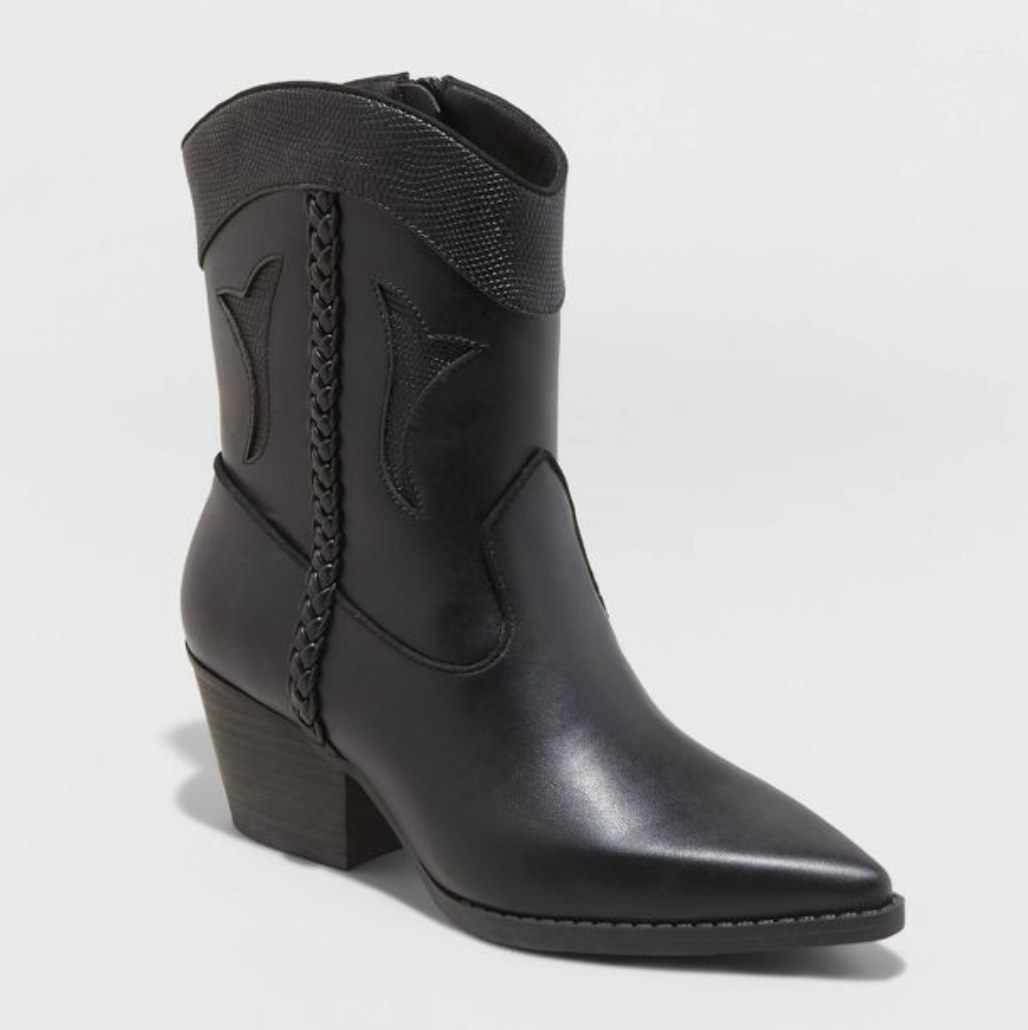 The black boots have a small heel, braided stitching and western designs