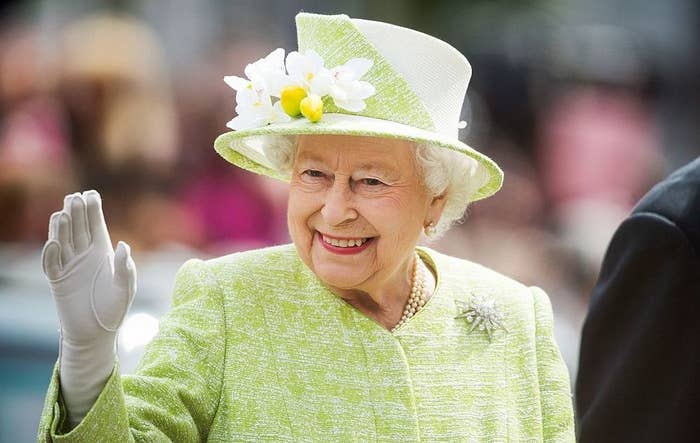 Queen Elizabeth II waves during a walk about around Windsor