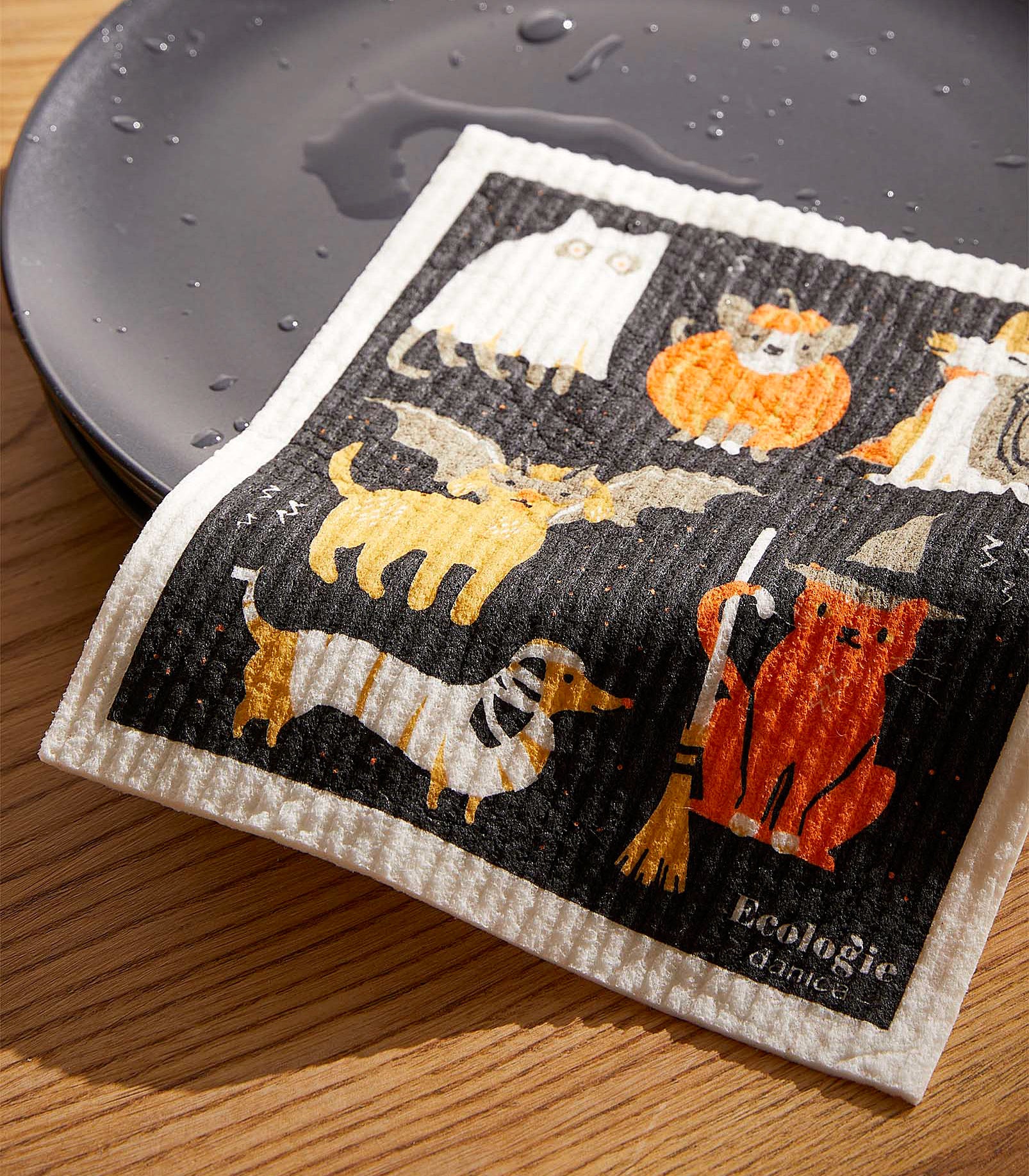 a sponge with animals wearing costumes illustrated on it