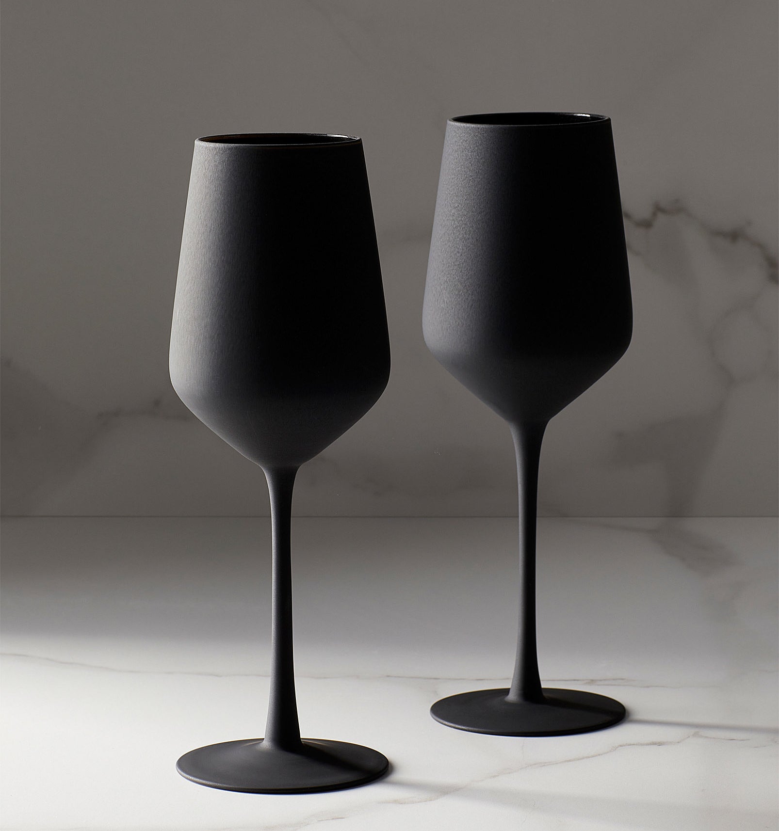 two matte black wine glasses