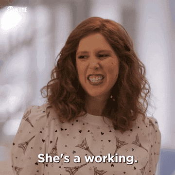 Vanessa Bayer saying, &quot;She&#x27;s a working girl&quot;