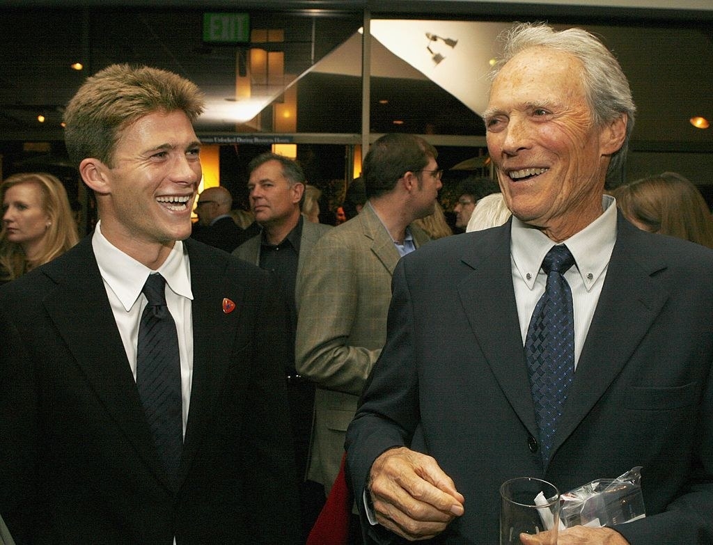 Clint and Scott laughing at an event