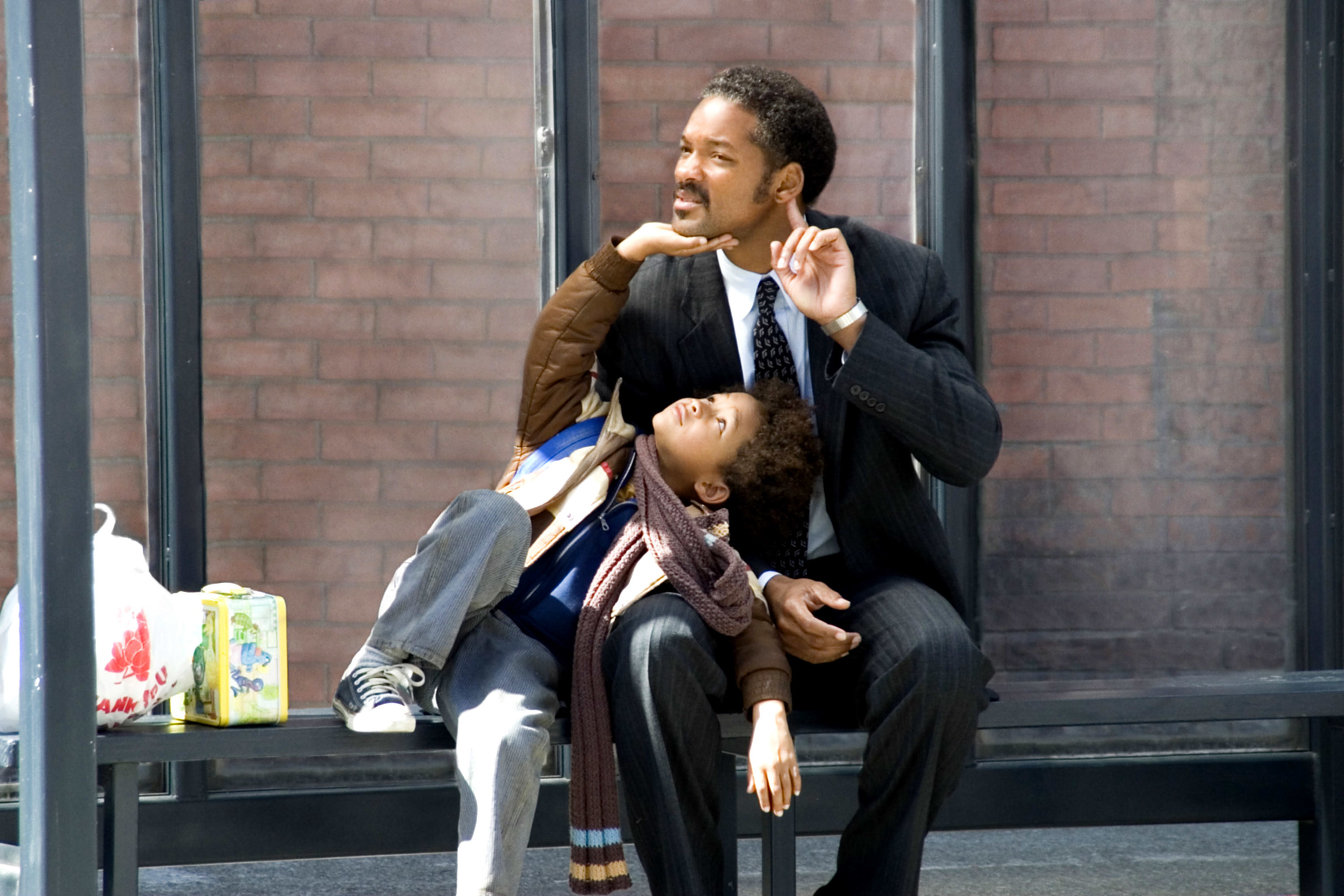 jadan and will sitting outside in a scene from the movie