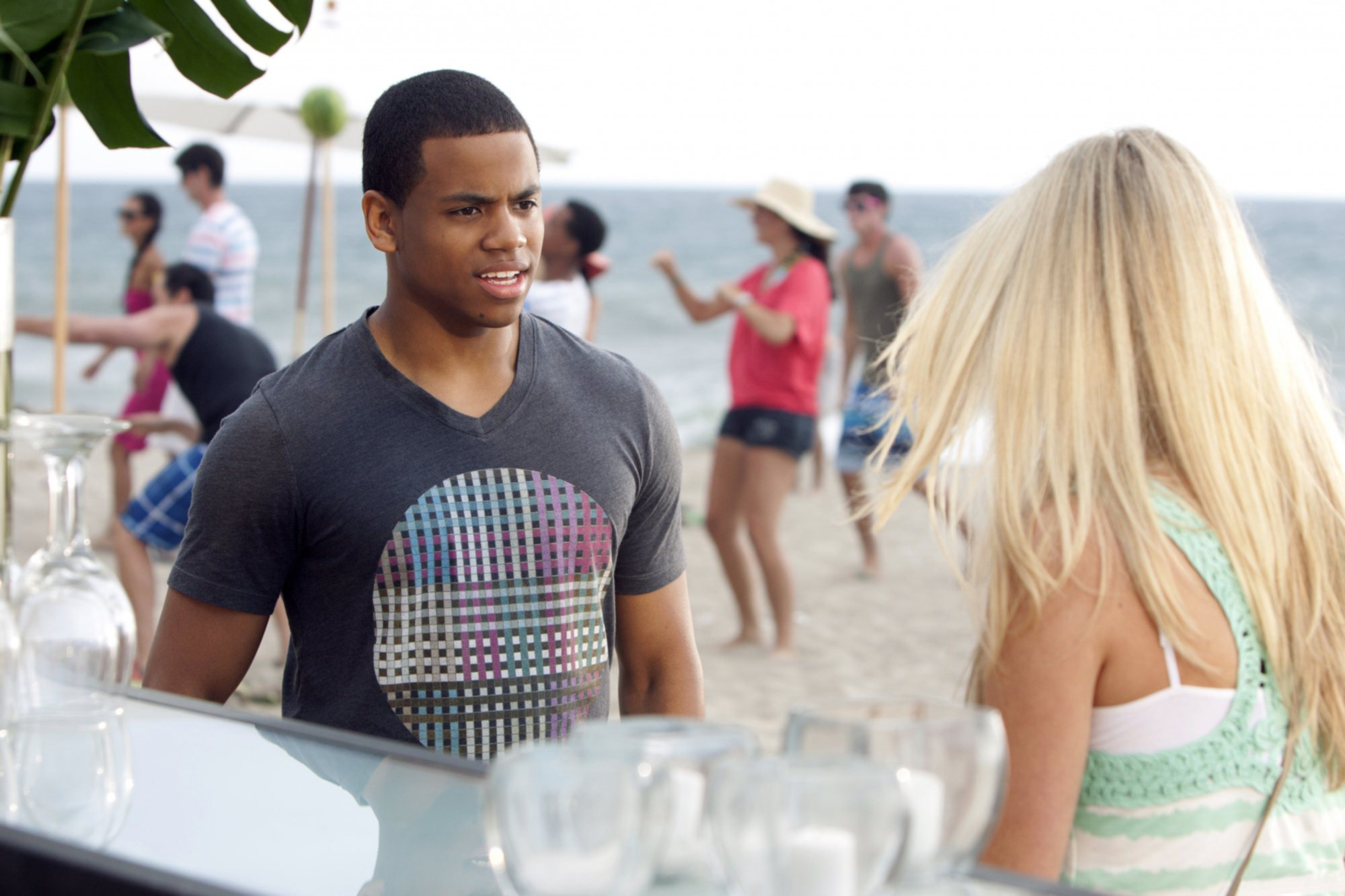 Wilds on the beach with a costar for a scene