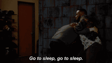 GIF of Lamorne Morris as Winston in New Girl saying &quot;Go to sleep, go to sleep&quot; to Jake Johnson