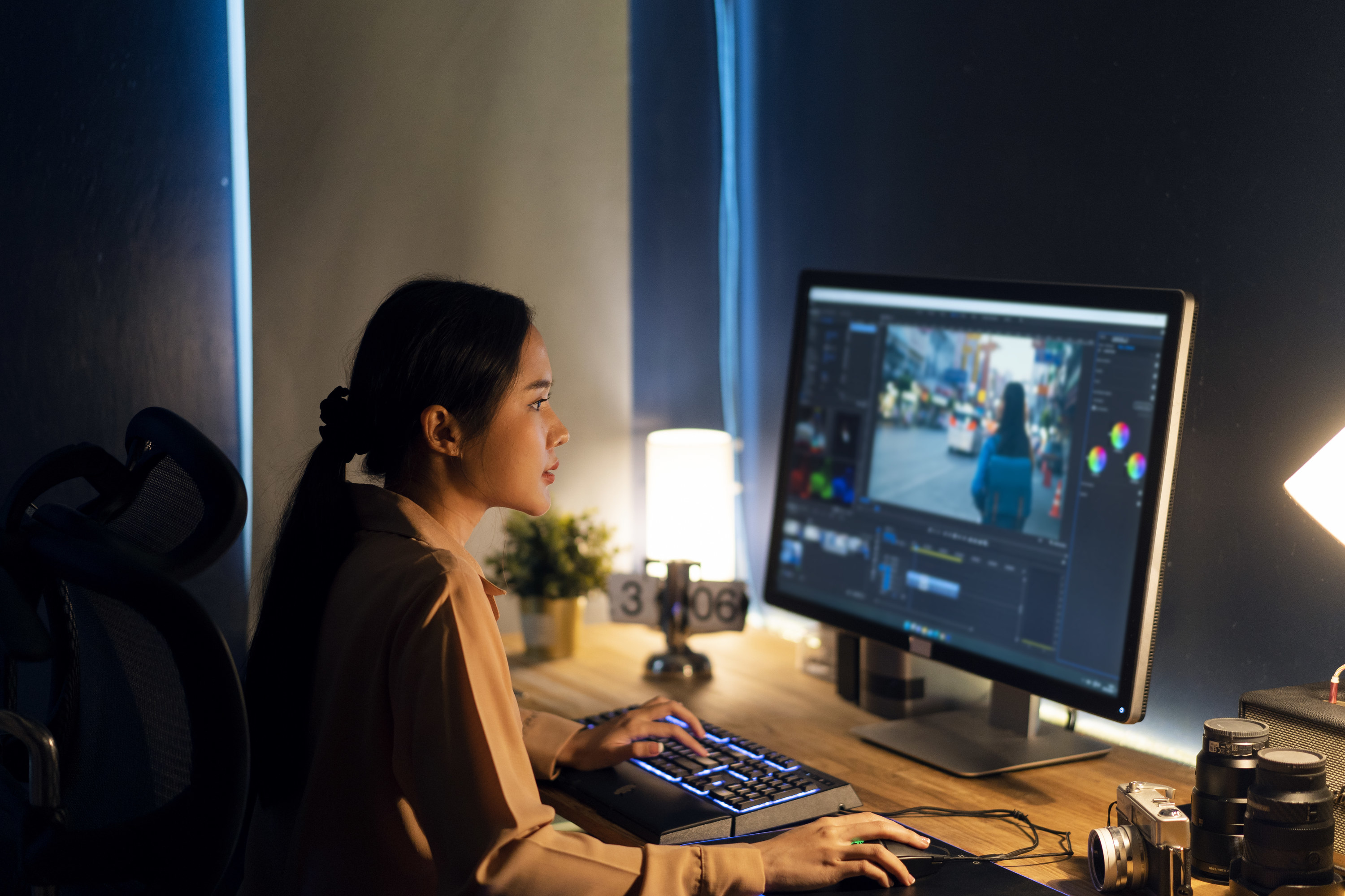 Woman working on her website from her home computer