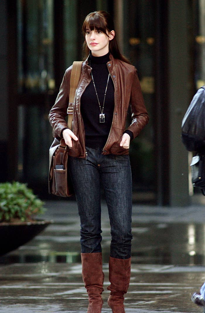 In the movie Anne wears a brown leather jacket, black turtleneck, jeans and brown knee high boots