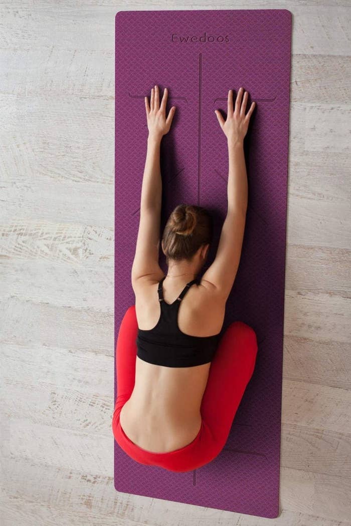 A model using the yoga mat