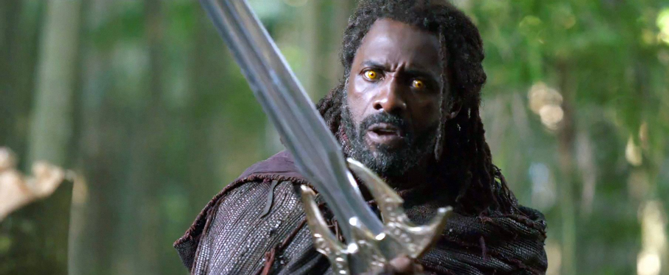 Idris wielding a sword