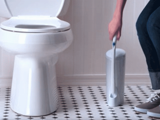 a gif of a person using the toilet wand