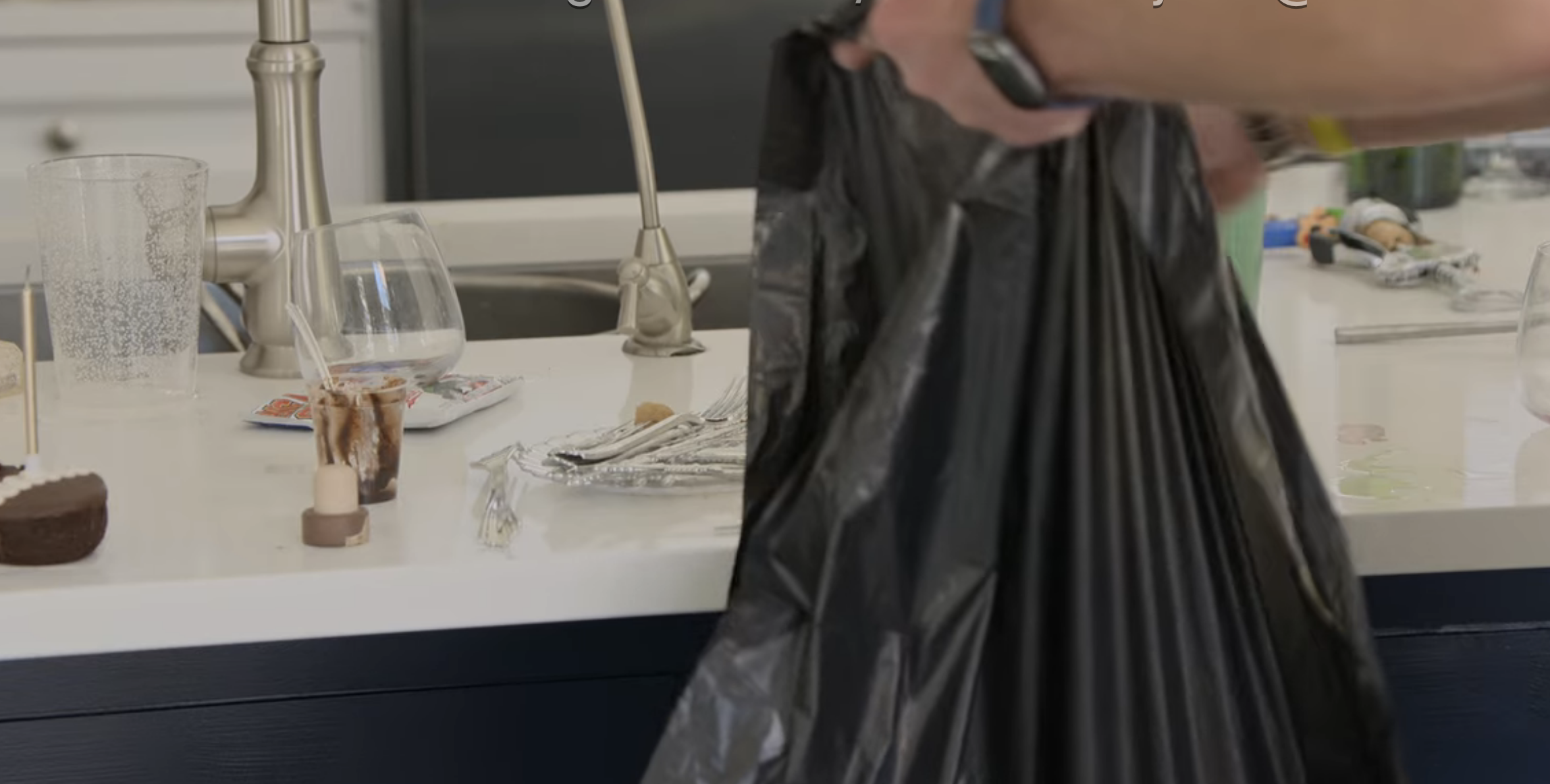 Someone with a trashbag