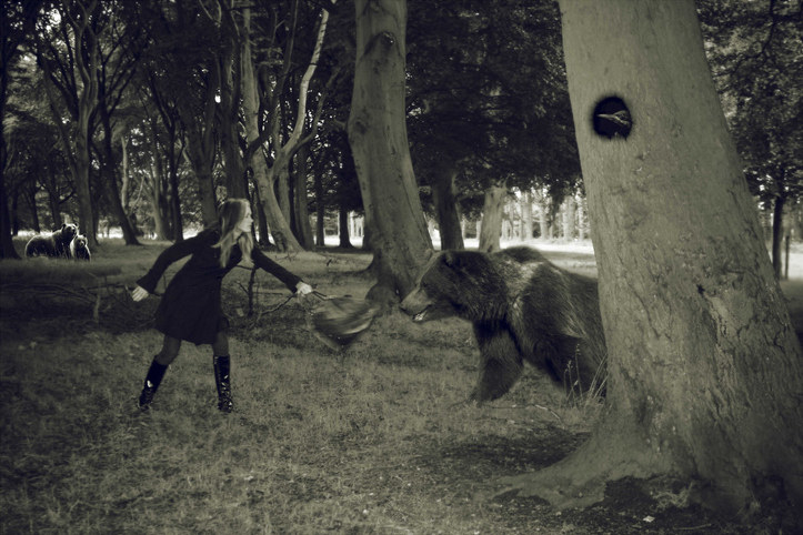 A woman confronting a bear