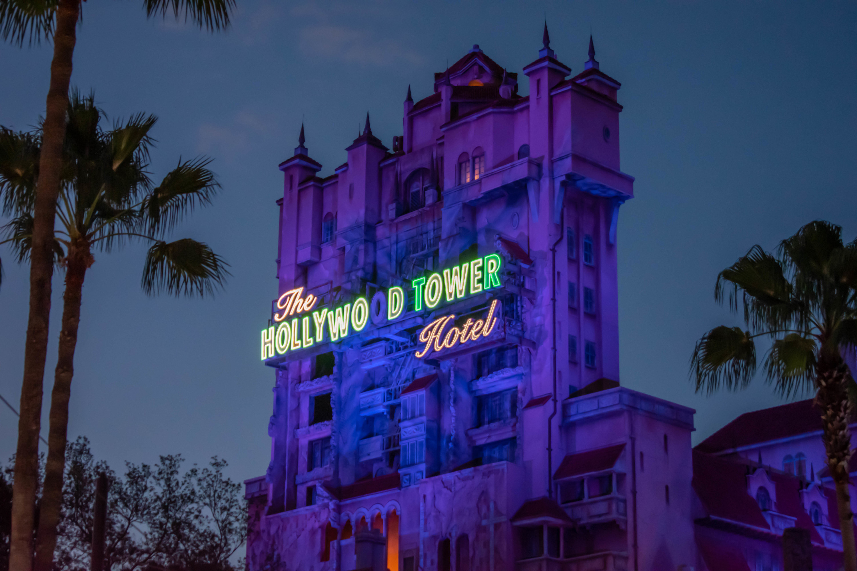 The Twilight Zone Tower of Terror Ride at Disney Hollywood Studios lights up for its late night overlay
