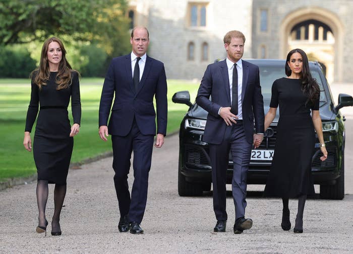 Princes William and Harry with their wives