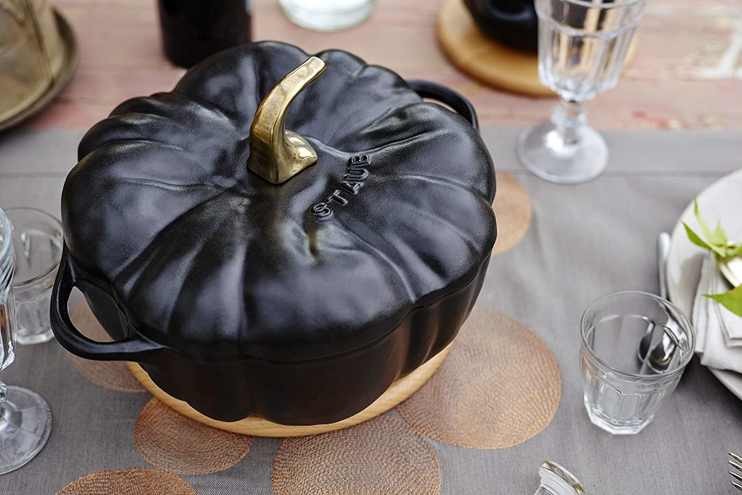 the pumpkin serving dish on a table